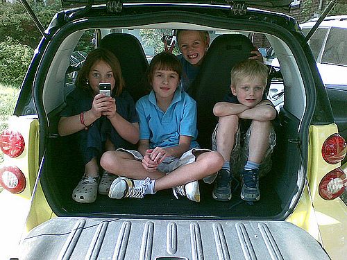 children in back of car